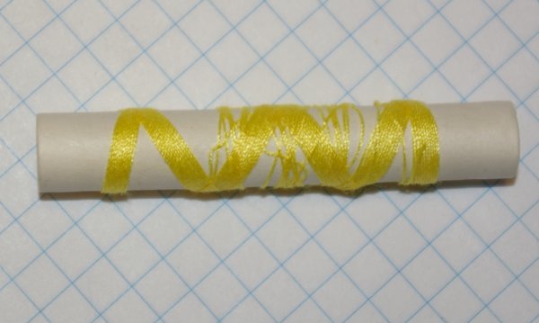 Leere Nähgarnrolle am Ende des Quilts. Leere Nähgarnrolle am Ende des Quilts.